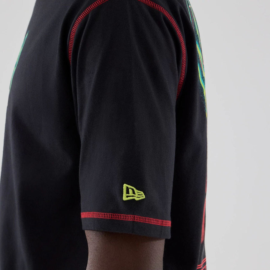 The Male model is wearing Stranger Things Black Oversized T-Shirt  5