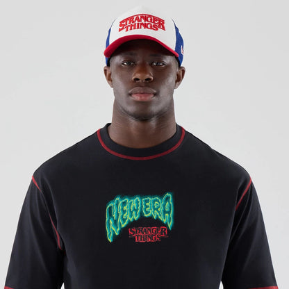 The Male model is wearing Stranger Things Black Oversized T-Shirt  7