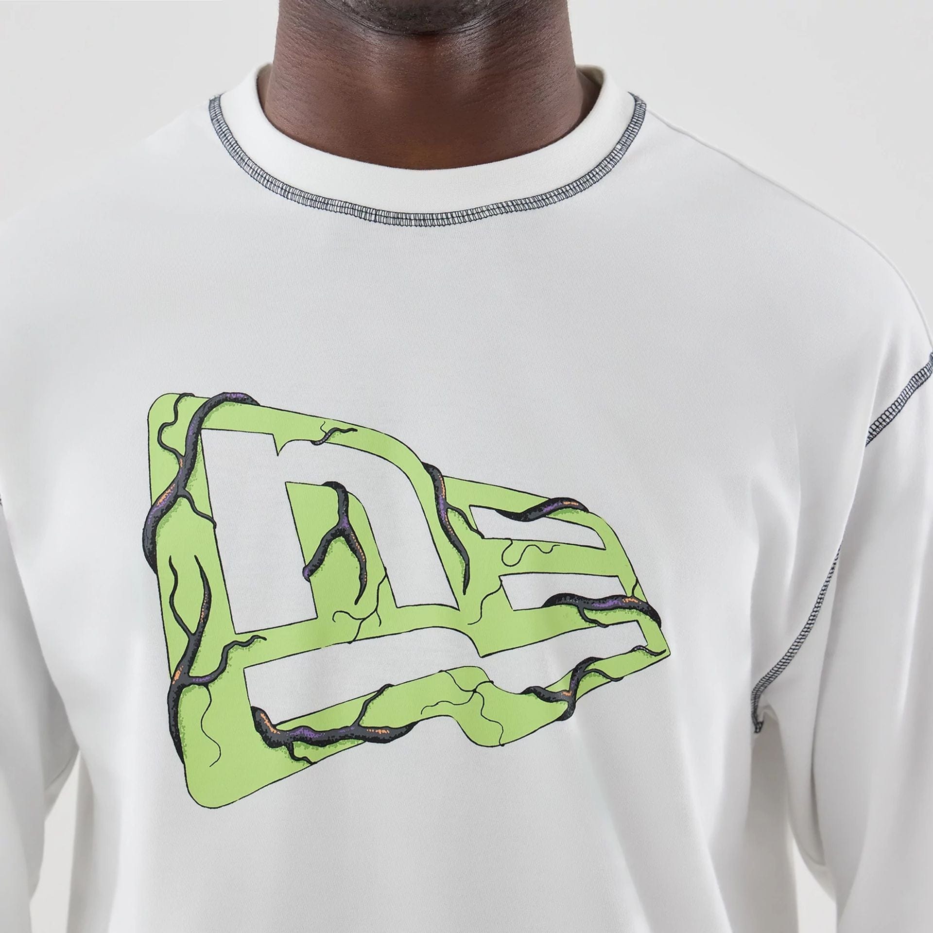 The Male model is wearing Stranger Things White Oversized Long Sleeve T-Shirt  7