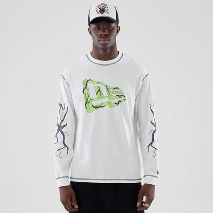 The Male model is wearing Stranger Things White Oversized Long Sleeve T-Shirt  1