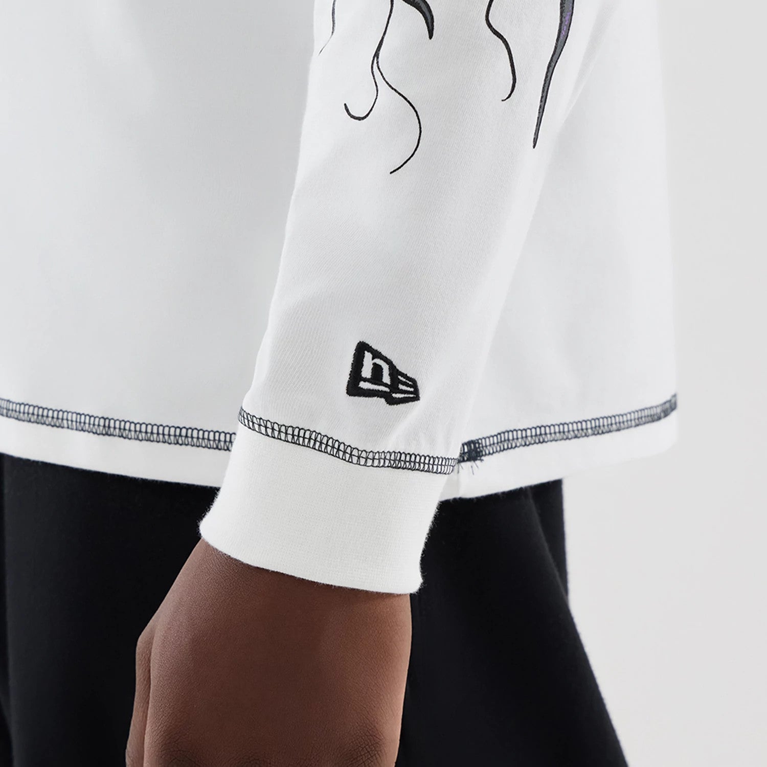 The Male model is wearing Stranger Things White Oversized Long Sleeve T-Shirt 5