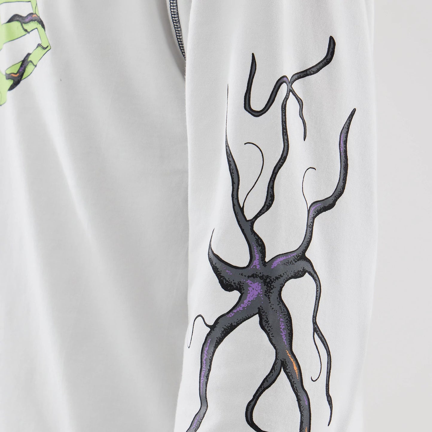 The Male model is wearing Stranger Things White Oversized Long Sleeve T-Shirt 6