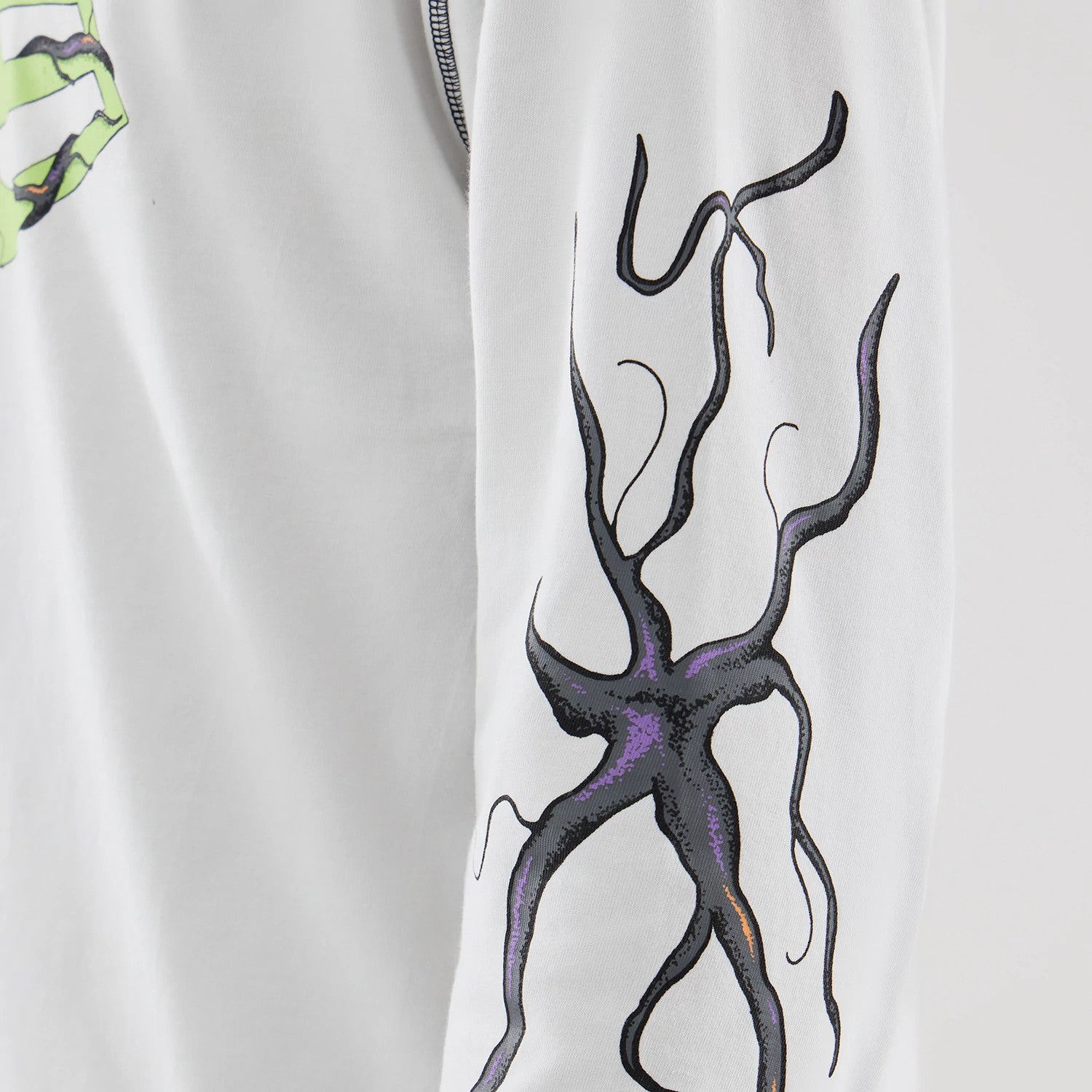 The Male model is wearing Stranger Things White Oversized Long Sleeve T-Shirt 6