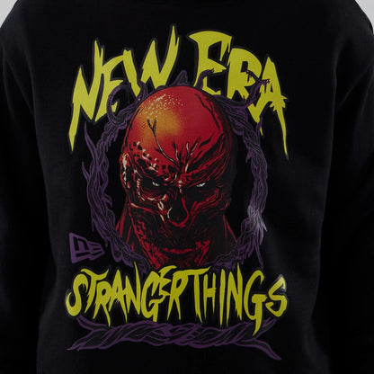 The Male model is wearing Stranger Things Black Oversized Pullover Hoodie  3