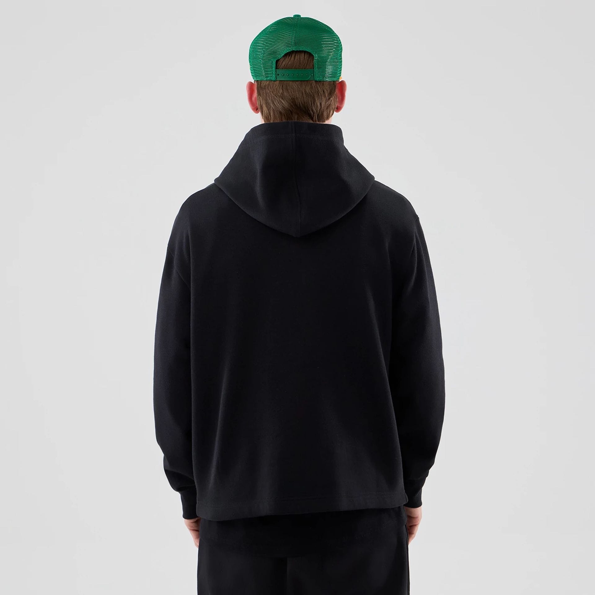 The Male model is wearing Stranger Things Black Oversized Pullover Hoodie  2