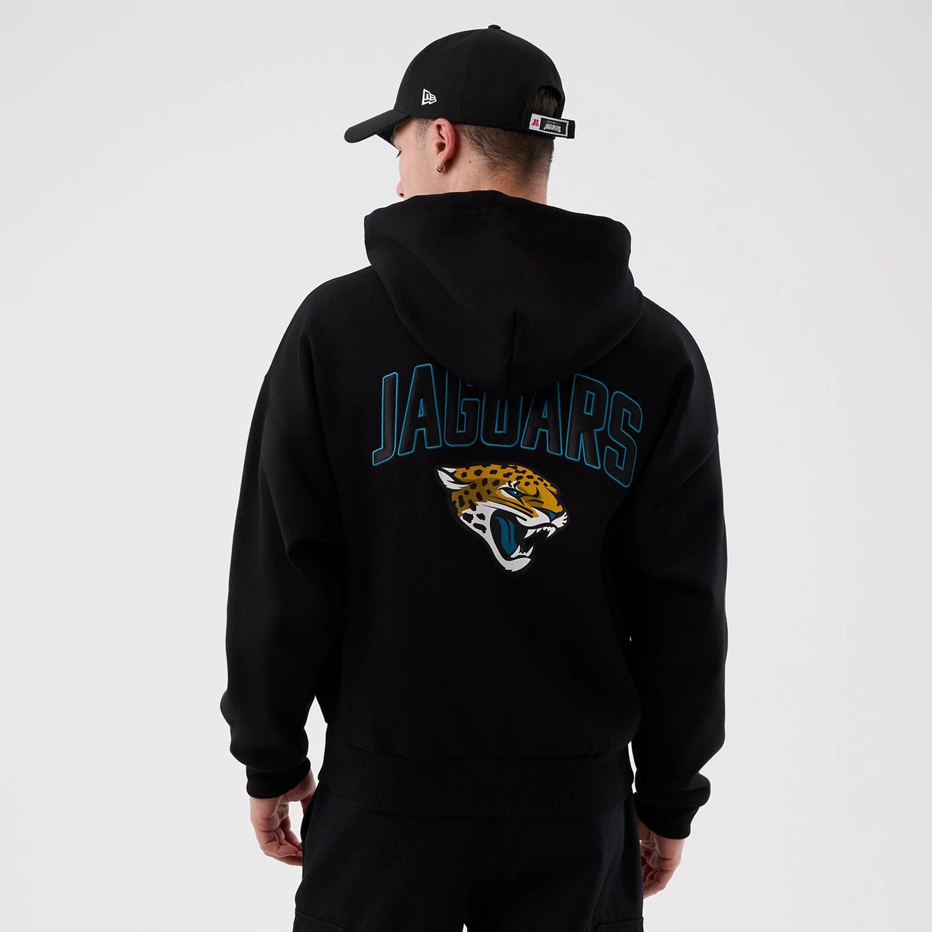 The Male model is wearing Jacksonville Jaguars NFL International Series Games Black Full Zip Hoodie 2