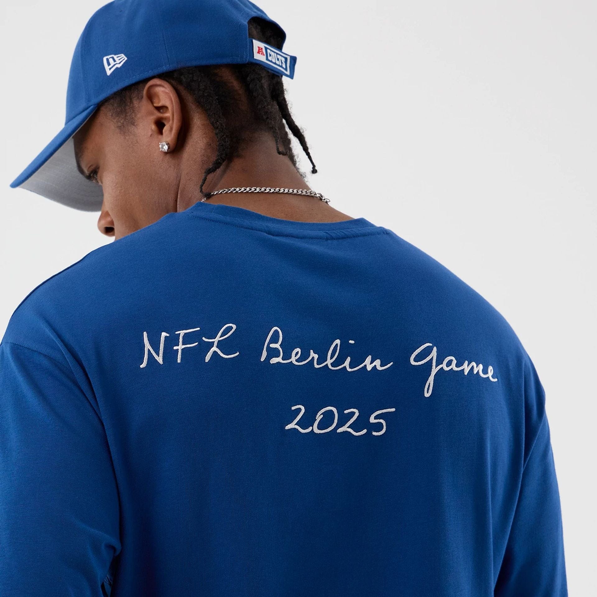 The Male model is wearing Indianapolis Colts NFL International Series Games Blue Oversized T-Shirt  6