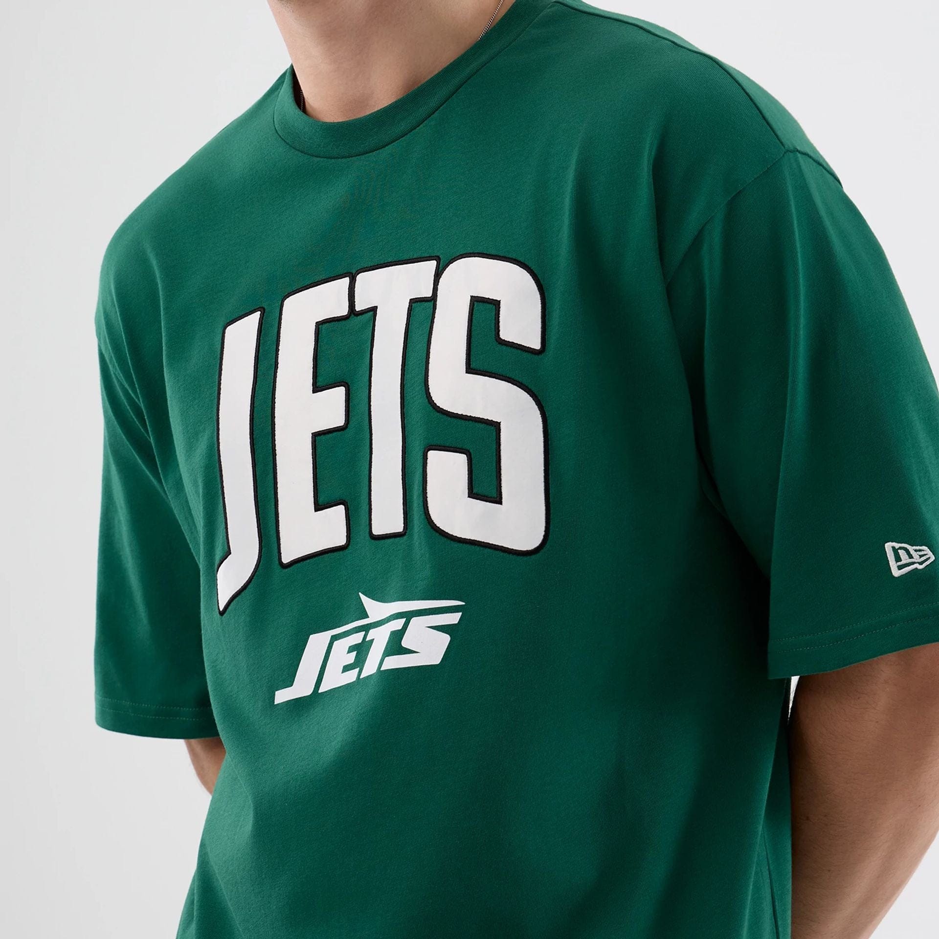 The Male model is wearing New York Jets NFL International Series Games Green Oversized T-Shirt  5