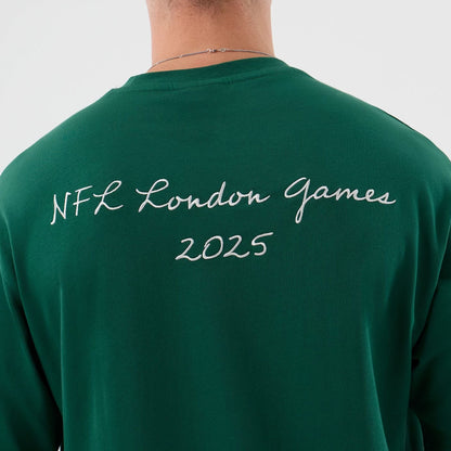 The Male model is wearing New York Jets NFL International Series Games Green Oversized T-Shirt  7