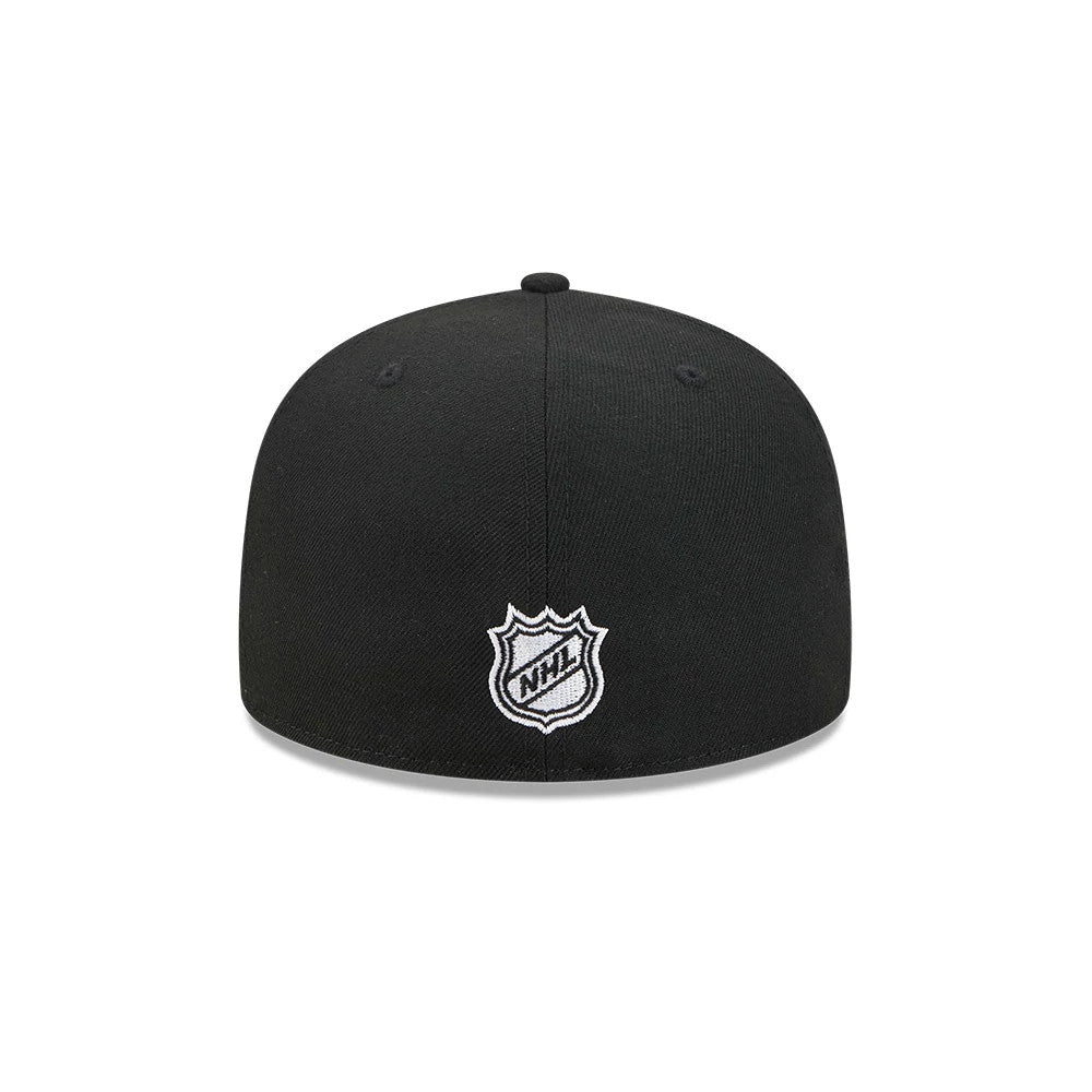 Pictured is this NHL Evergreen Chicago Blackhawks 59FIFTY Fitted cap in black. 7