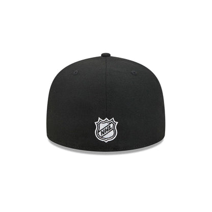Pictured is this NHL Evergreen Chicago Blackhawks 59FIFTY Fitted cap in black. 7