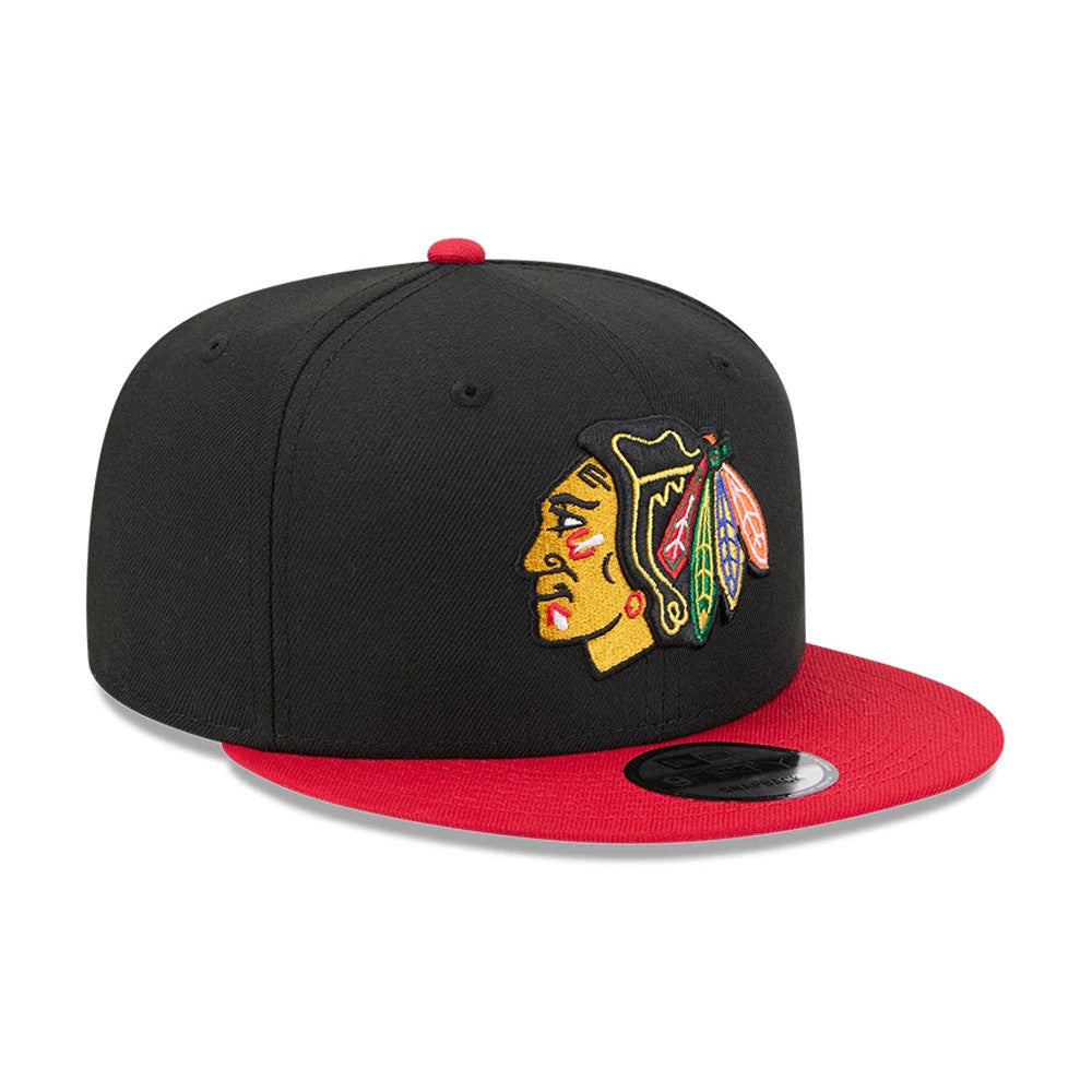 Pictured is this NHL Evergreen Chicago Blackhawks 9FIFTY Snapback cap in black. 4