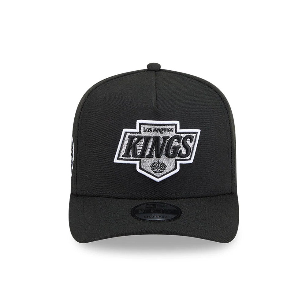 Pictured is this NHL Evergreen LA Kings 9FIFTY A-Frame Snapback cap in black. 3