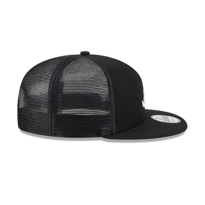 Pictured is this MLB Evergreen Atlanta Braves 9FIFTY Trucker cap in black. 7
