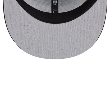 Chicago White Sox MLB Evergreen Black New Era 9FIFTY Trucker Adjustable Cap, inside view showing the grey undervisor with black interior taping, featuring white stitching on the visor and a central New Era label.