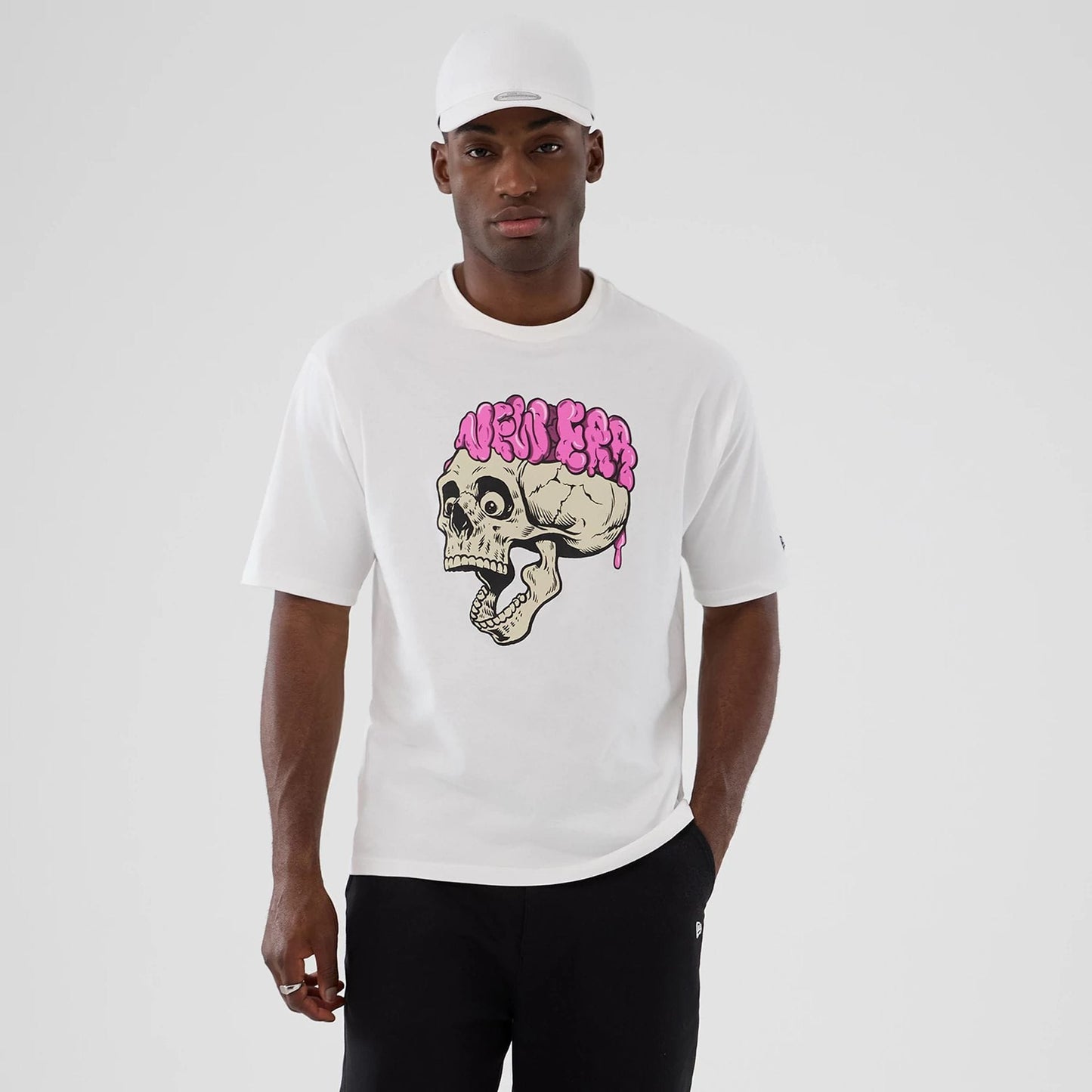 The Male model is wearing  New Era Halloween Skull Graphic White Oversized T-Shirt 1