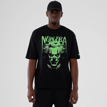 The Male model is wearing  New Era Halloween Clown Graphic Black Oversized T-Shirt 1