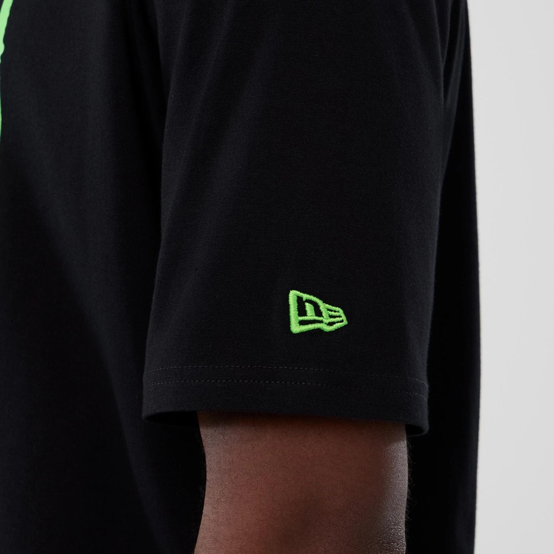 The Male model is wearing  New Era Halloween Clown Graphic Black Oversized T-Shirt  5