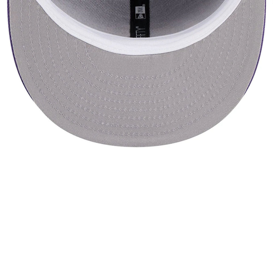 Pictured is this NBA Hardwood Classic LA Lakers 59FIFTY Fitted cap in purple. 2