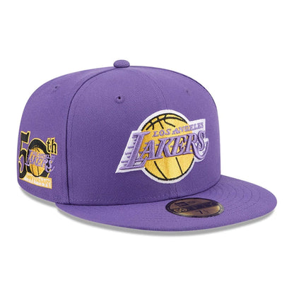 Pictured is this NBA Hardwood Classic LA Lakers 59FIFTY Fitted cap in purple. 1