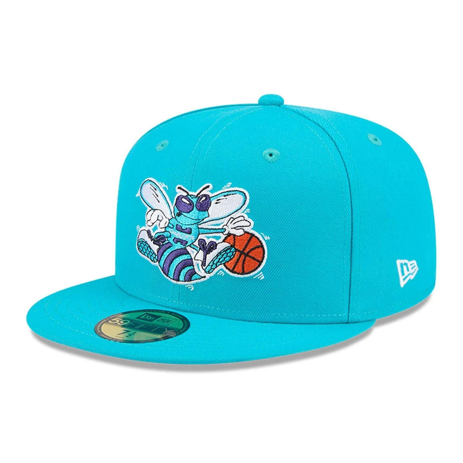 Pictured is this NBA Hardwood Classic Charlotte Hornets 59FIFTY Fitted cap in turquoise. 4