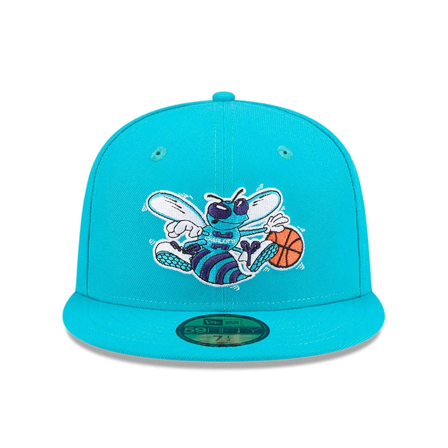 Pictured is this NBA Hardwood Classic Charlotte Hornets 59FIFTY Fitted cap in turquoise. 3