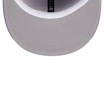 Pictured is this NBA Hardwood Classic Toronto Raptors 59FIFTY Fitted cap in bright purple. 2