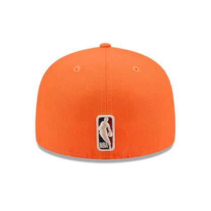 Pictured is this NBA Hardwood Classic Phoenix Suns 59FIFTY Fitted cap in orange. 5