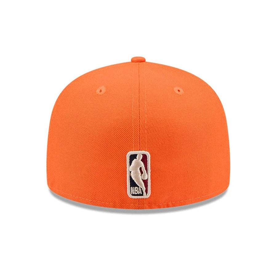 Pictured is this NBA Hardwood Classic Phoenix Suns 59FIFTY Fitted cap in orange. 5
