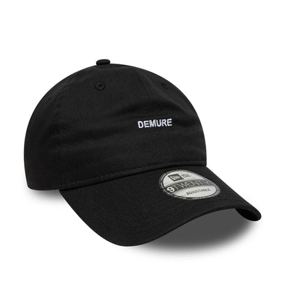 This is a  New Era Slogan Demure Black 9TWENTY Adjustable Cap 3