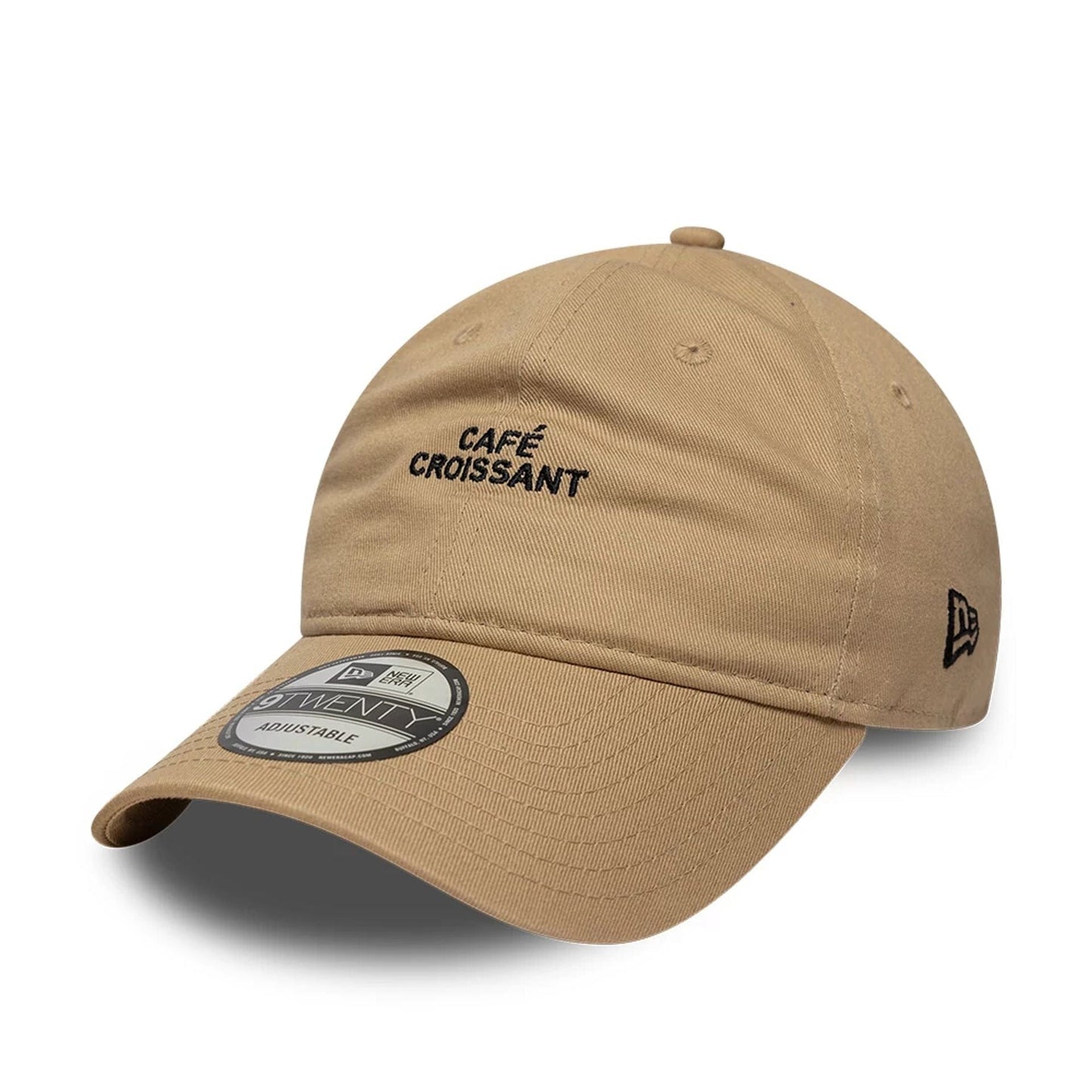 This is a  New Era Slogan Café Croissant Light Beige 9TWENTY Adjustable Cap 1