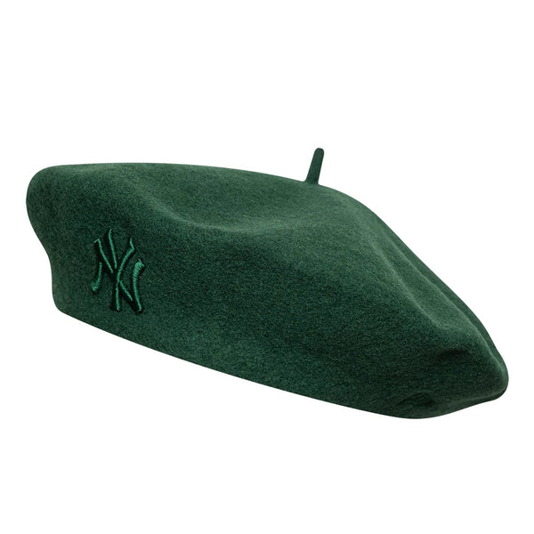 New Era New York Yankees Womens MLB Wool Dark Green Beret, side view showing the dark green NY logo embroidered on the front of the beret, crafted from wool with a soft texture and the classic beret stem at the top centre.