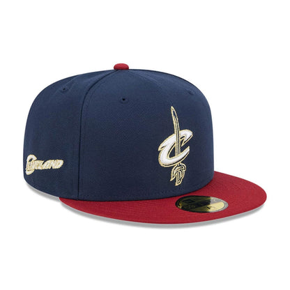 Pictured is this NBA Classic Cleveland Cavaliers 59FIFTY Fitted cap in dark blue. 1