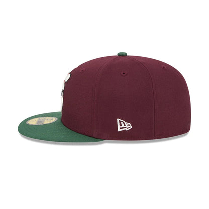 Pictured is this New Era Holiday Essentials 59FIFTY Fitted cap in dark red. 5