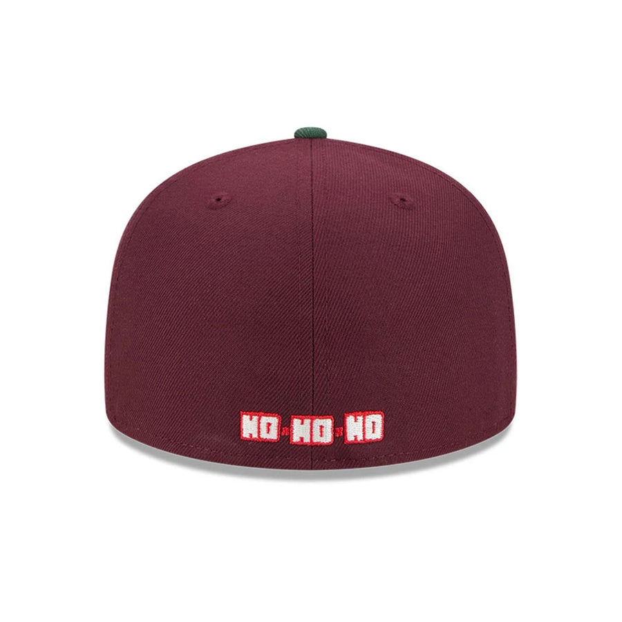 Pictured is this New Era Holiday Essentials 59FIFTY Fitted cap in dark red. 3
