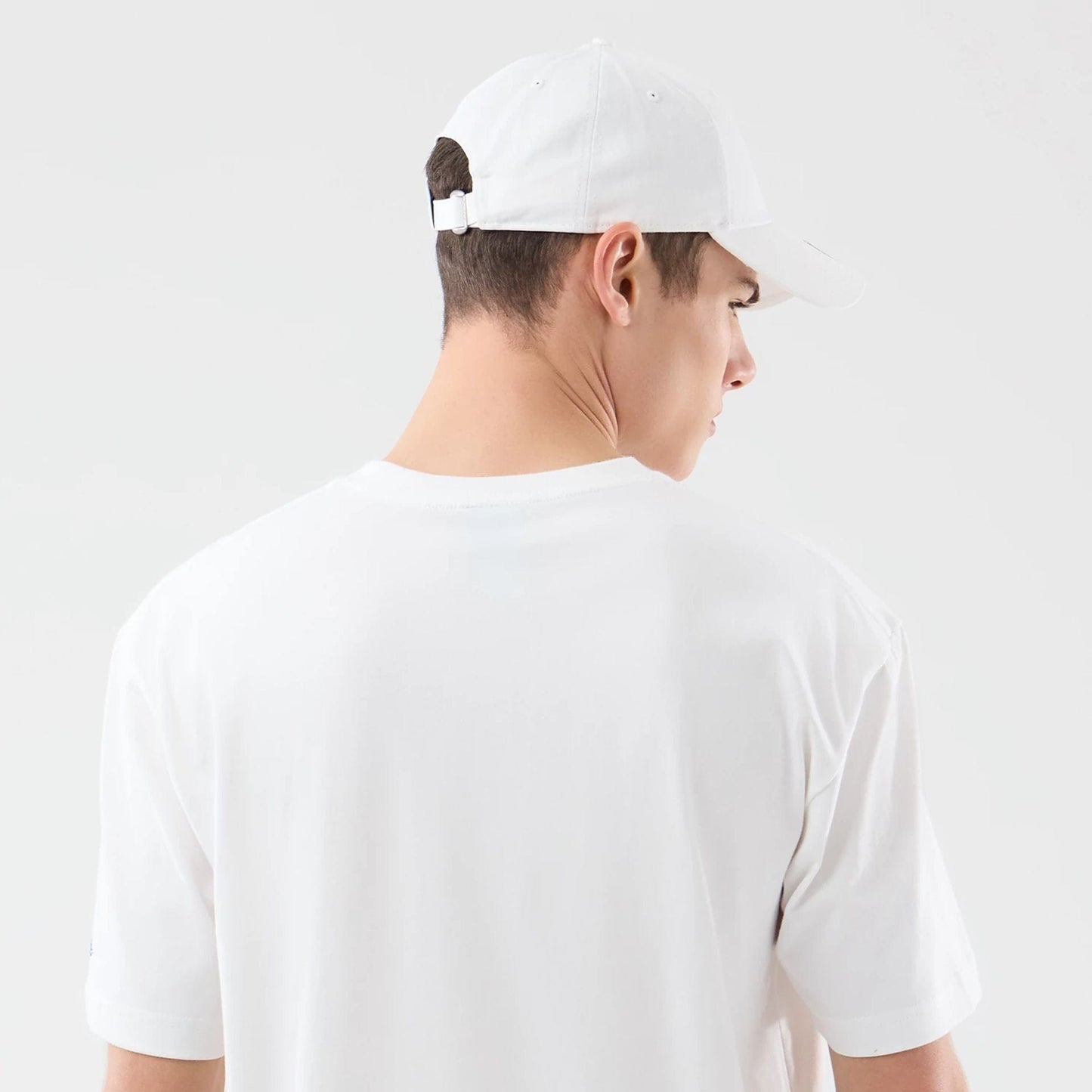 The model is wearing this Space Jam 2 X NBA Brooklyn Nets T-Shirt in white. 7