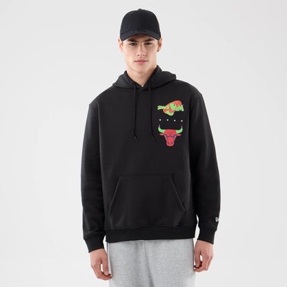 The model is wearing this Space Jam 2 X NBA Chicago Bulls Pullover Hoodie in black. 1