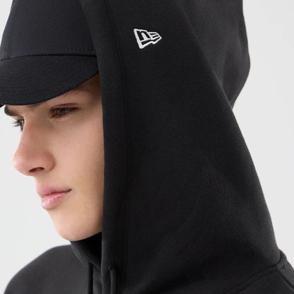 The model is wearing this Space Jam 2 X NBA Chicago Bulls Pullover Hoodie in black. 6