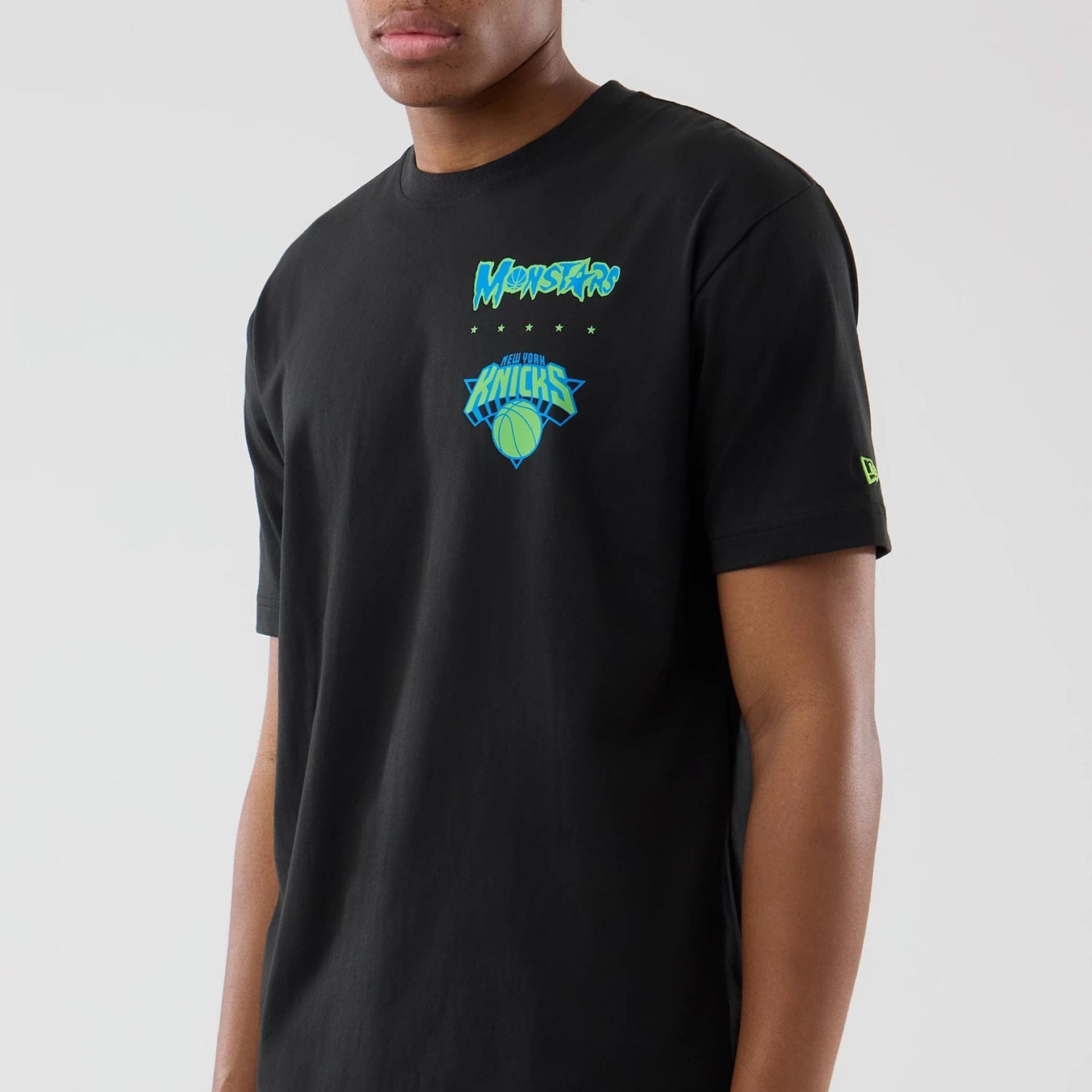 The model is wearing this Space Jam 2 X NBA New York Knicks T-Shirt in black. 5