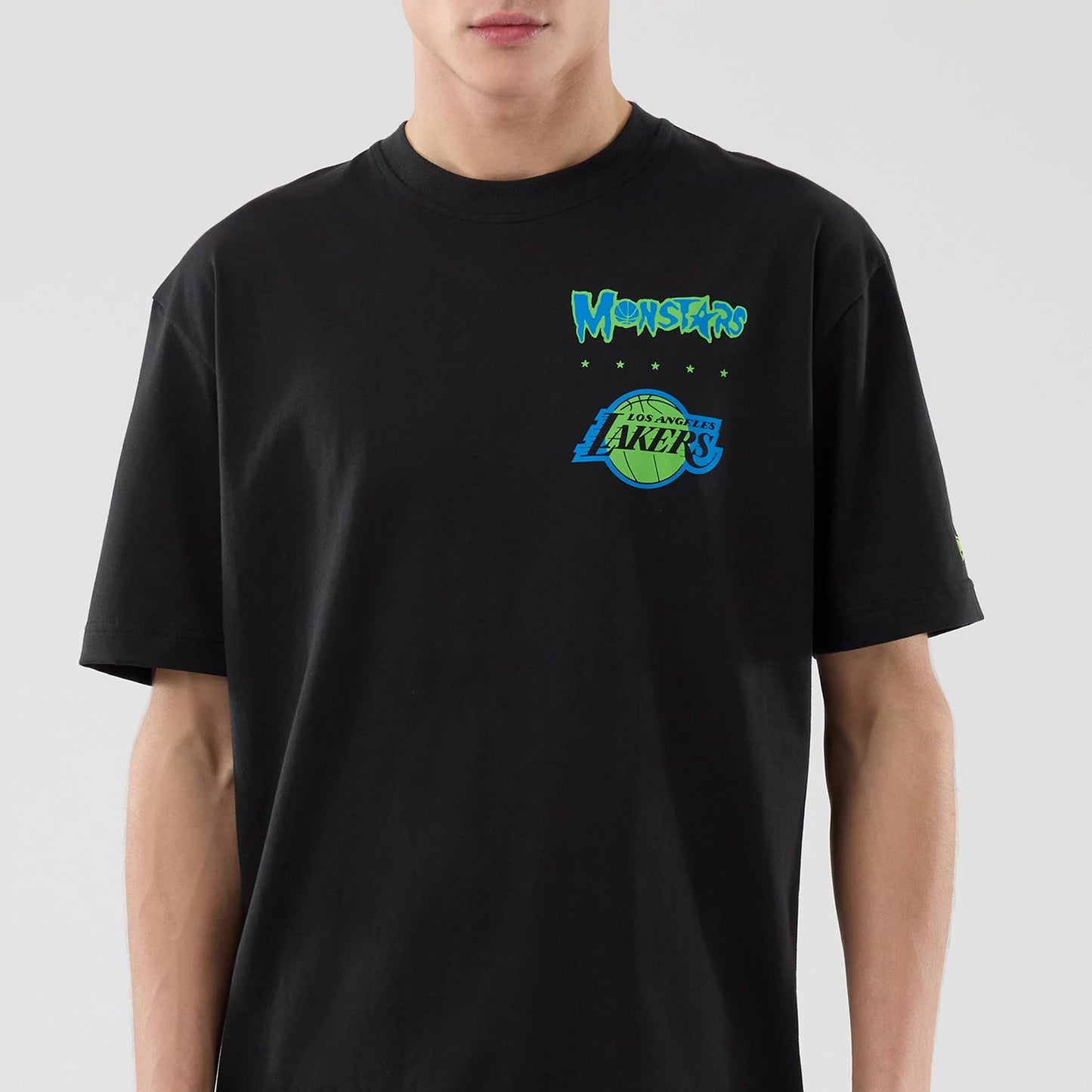 The model is wearing this Space Jam 2 X NBA LA Lakers T-Shirt in black. 7