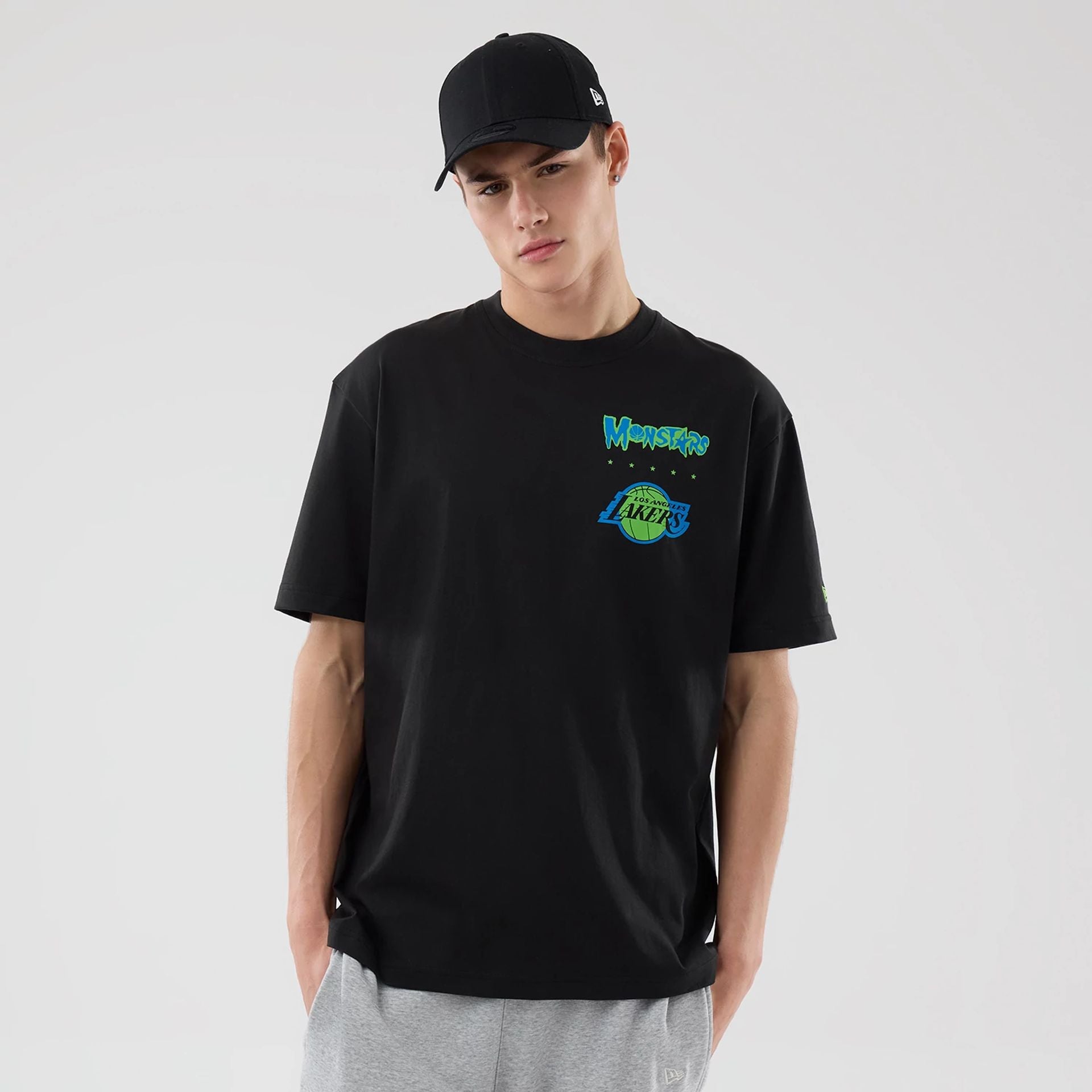 The model is wearing this Space Jam 2 X NBA LA Lakers T-Shirt in black. 1