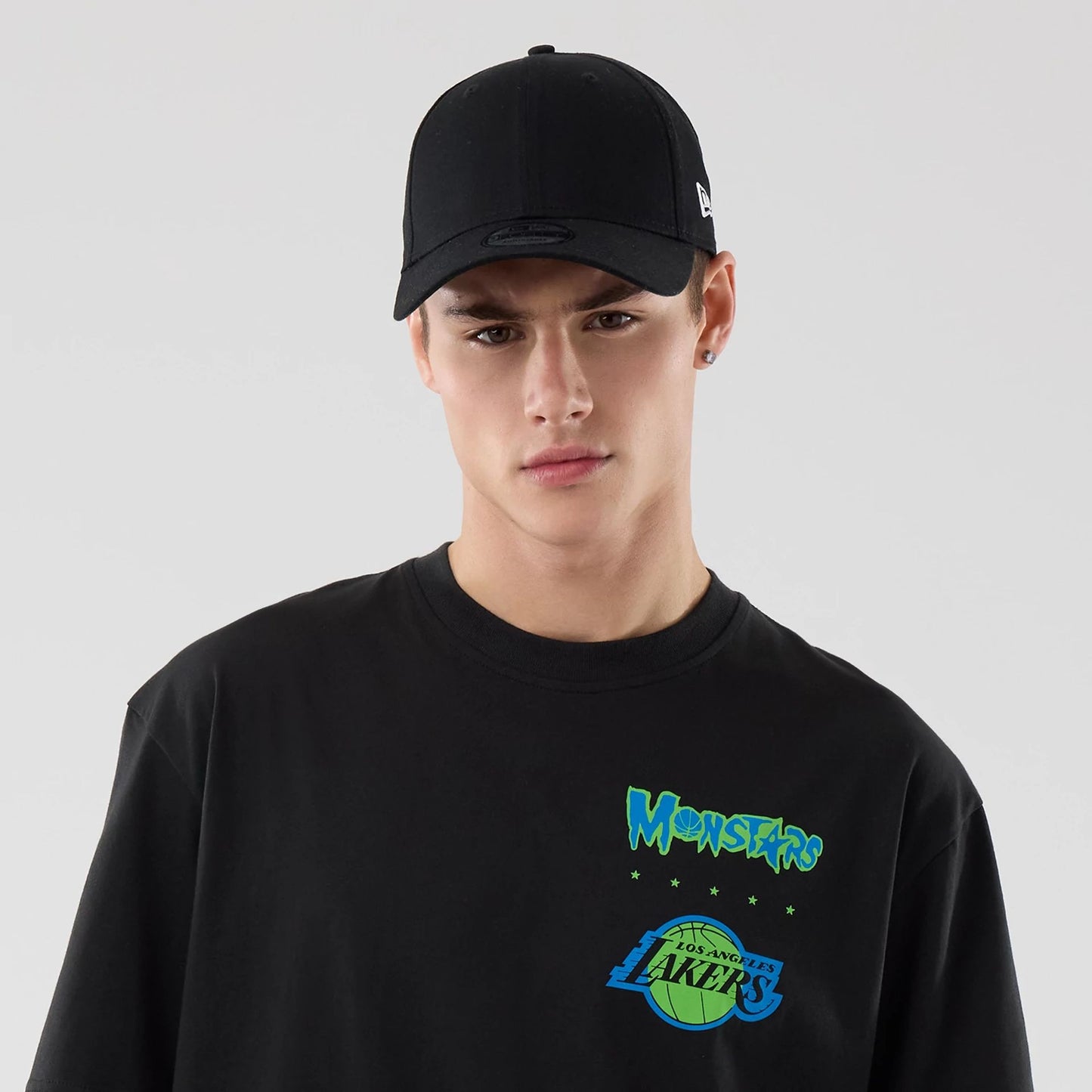 The model is wearing this Space Jam 2 X NBA LA Lakers T-Shirt in black. 5