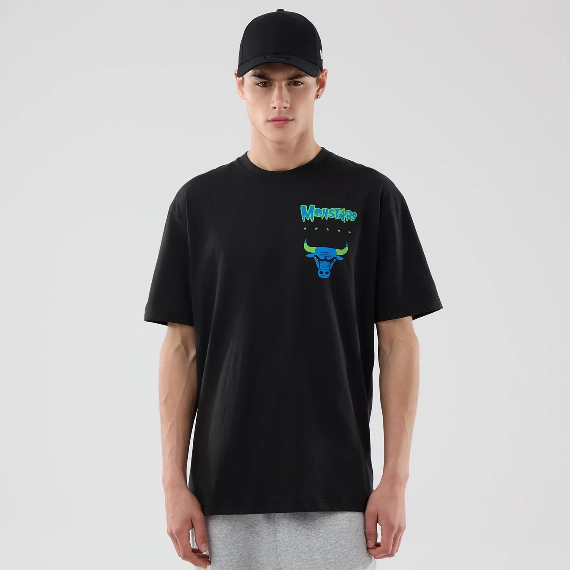 The model is wearing this Space Jam 2 X NBA Chicago Bulls T-Shirt in black. 1