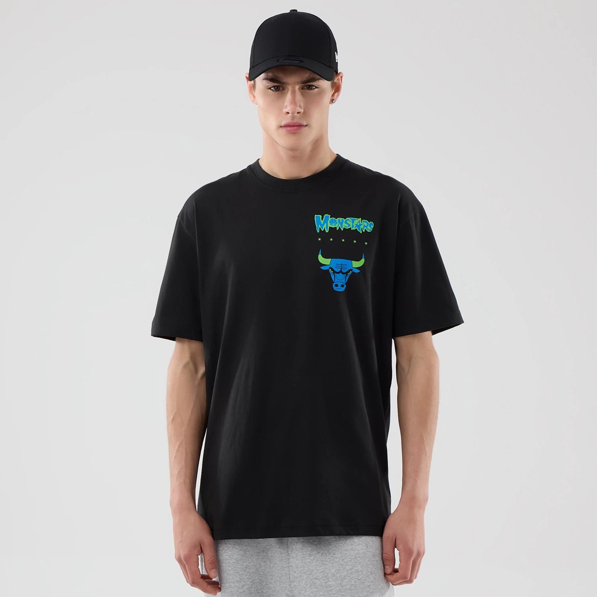 The model is wearing this Space Jam 2 X NBA Chicago Bulls T-Shirt in black. 1