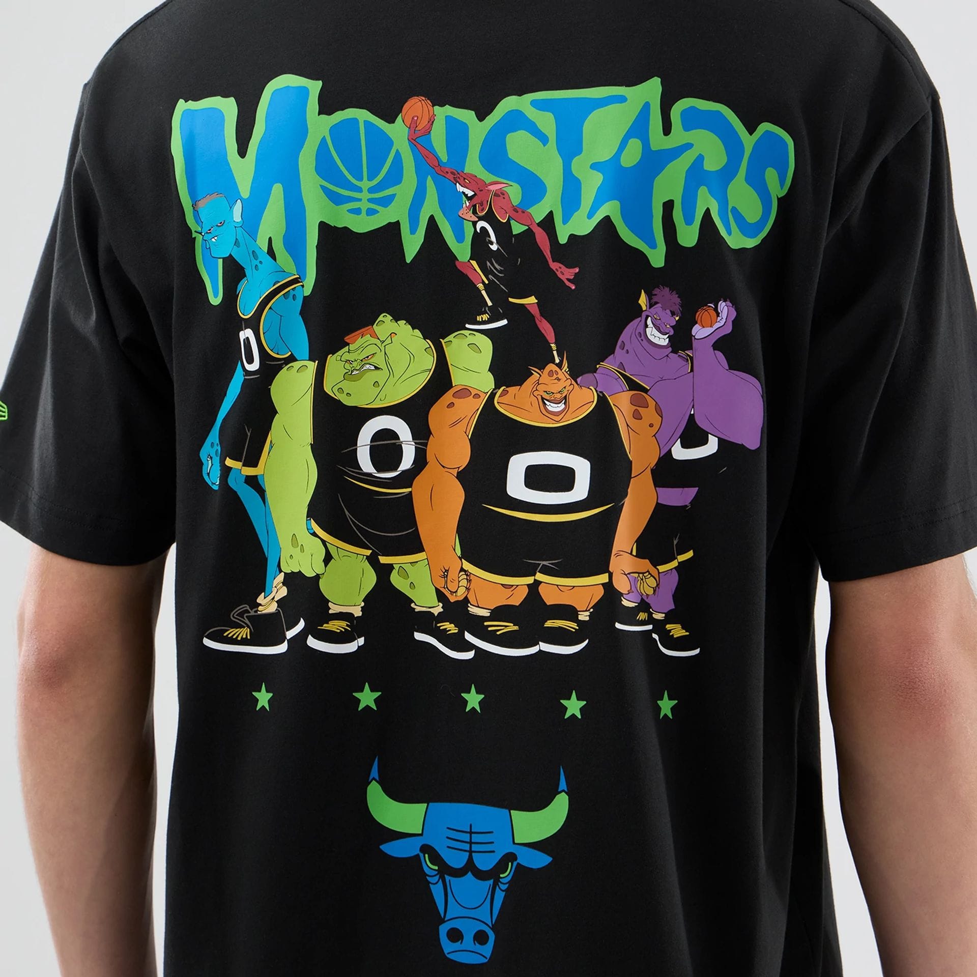 The model is wearing this Space Jam 2 X NBA Chicago Bulls T-Shirt in black. 4