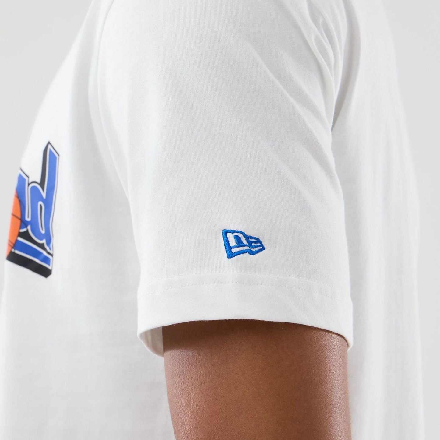 The model is wearing this Space Jam 2 X NBA Chicago Bulls T-Shirt in white. 4