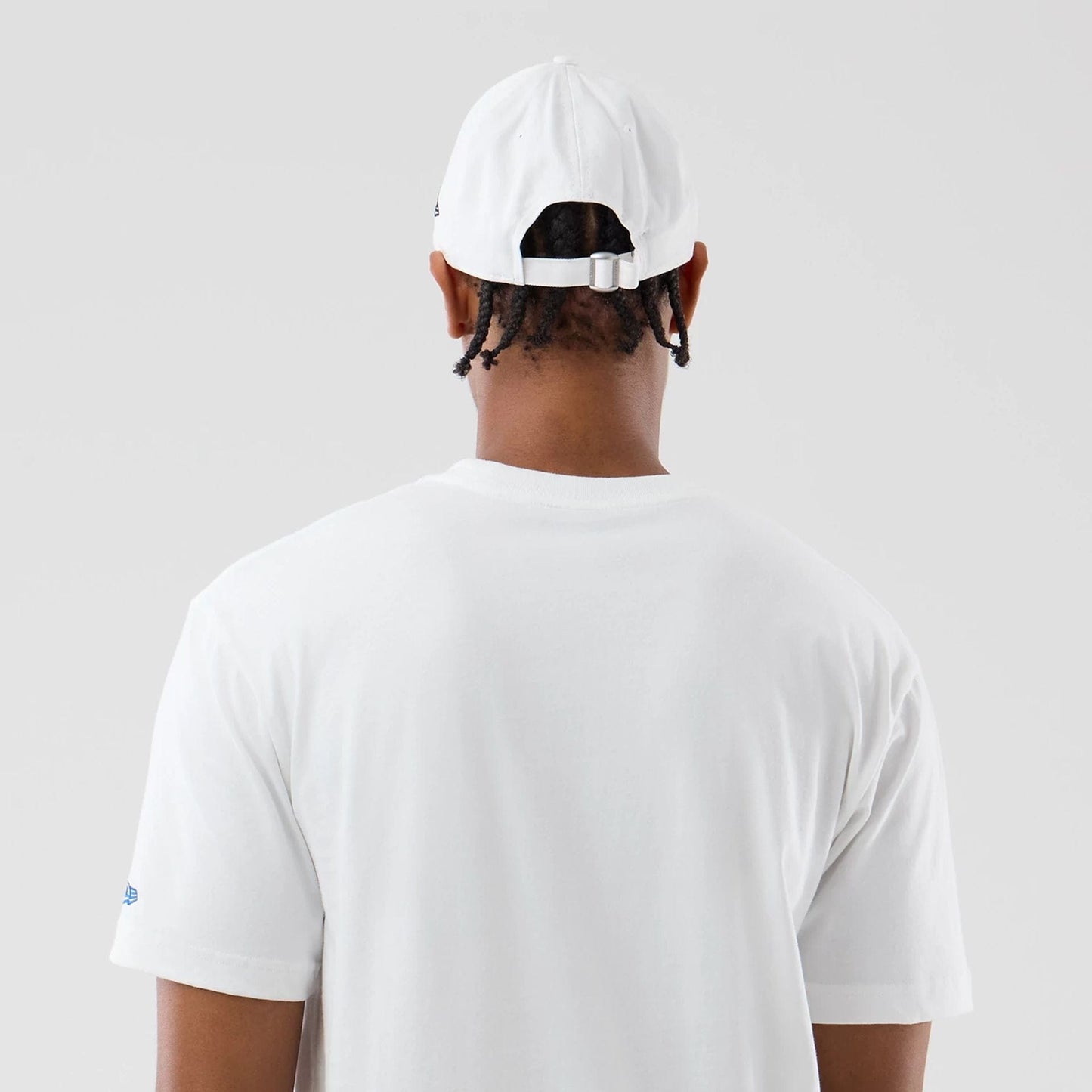 The model is wearing this Space Jam 2 X NBA Chicago Bulls T-Shirt in white. 7