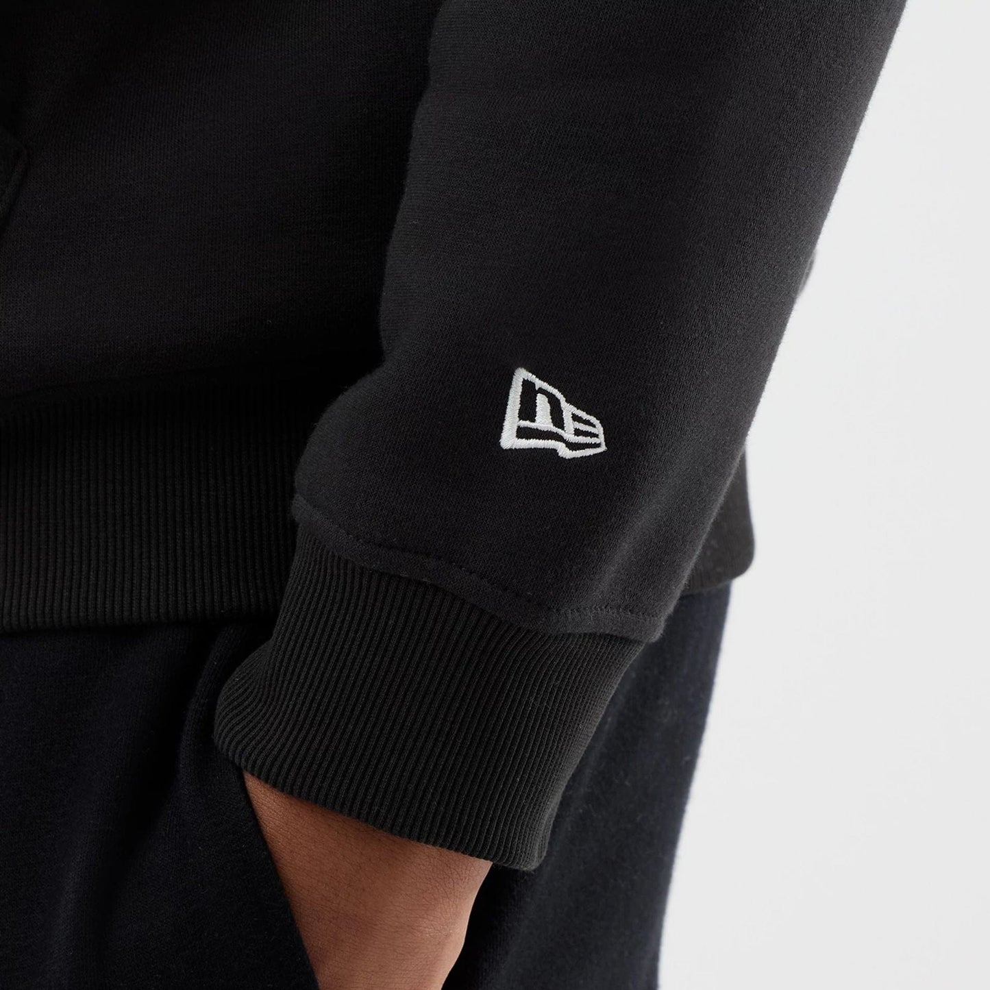 The model is wearing this Space Jam 2 X NBA LA Lakers Pullover Hoodie in black. 6