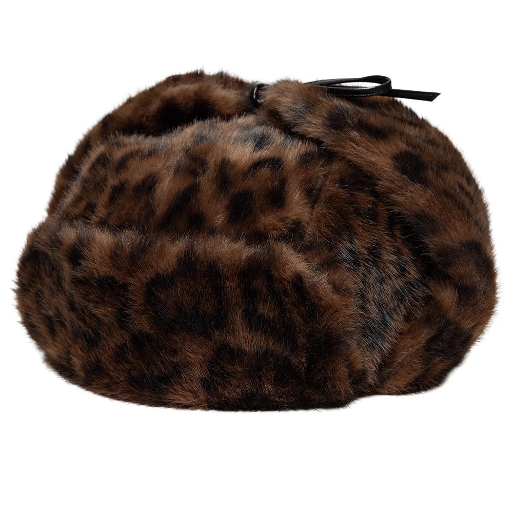 New Era Leopard Brown Trapper Hat, side view showing the soft leopard print faux fur texture with a structured shape and a black ribbon detail tied at the top, providing a distinctive and fashionable design.