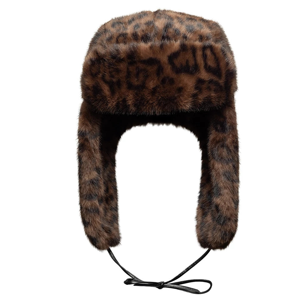 New Era Leopard Brown Trapper Hat, front view showing the luxurious faux fur exterior with a leopard print pattern, featuring long ear flaps and a black adjustable chin cord for a snug fit.